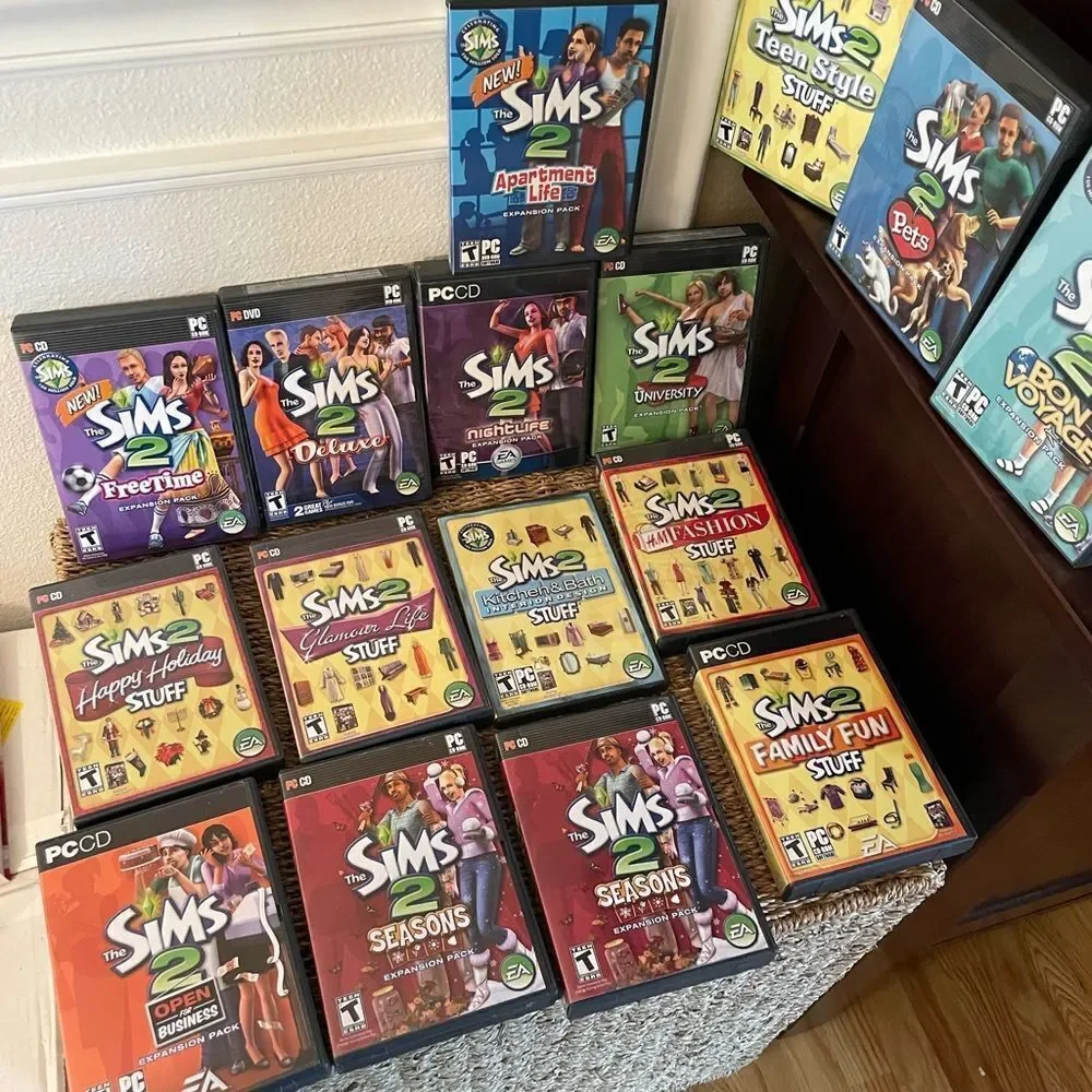 The SIMS PlayStation Vintage Side Video Game Lot PC DVD Pets Family Delux Sets